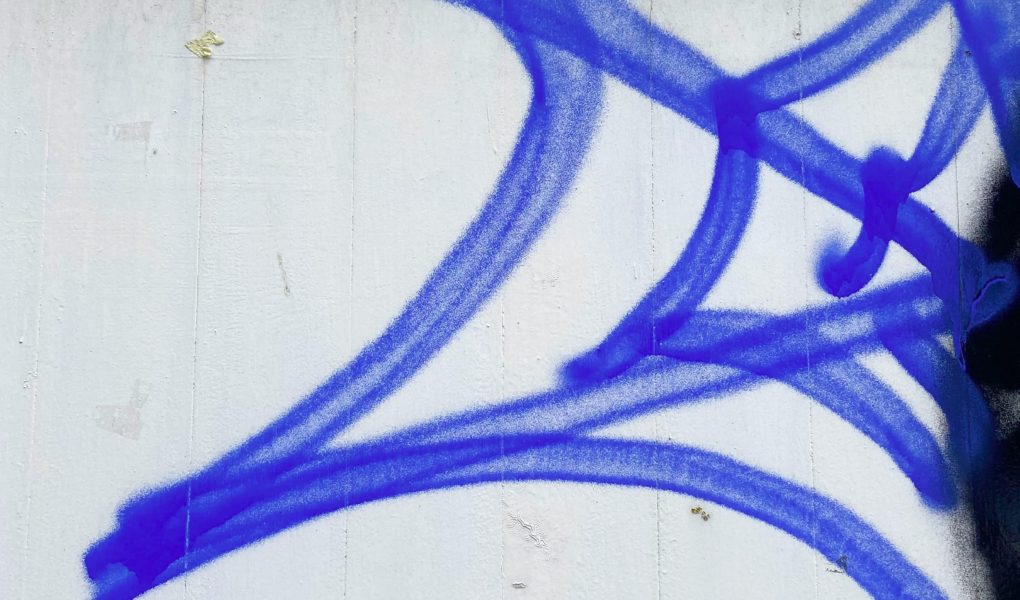 spider web painted in blue paint
