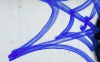 spider web painted in blue paint