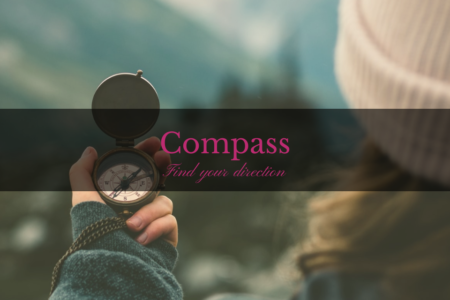 Compass group coaching slider image of woman holding a compass and the title